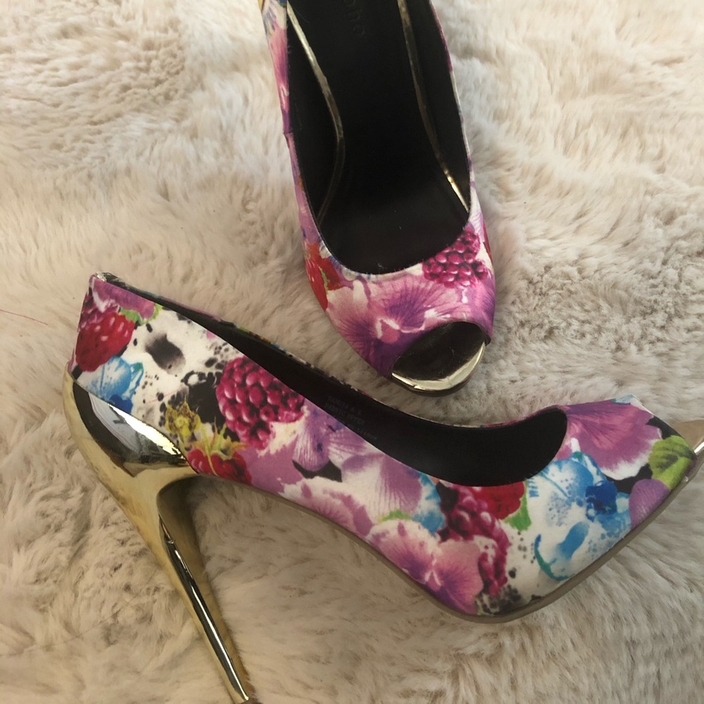 Open toe stilettos with gold heel